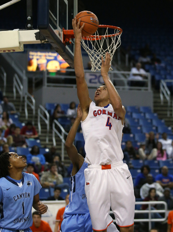 Bishop Gorman’s Chase Jeter shoots against Canyon Springs during the Division I state ...