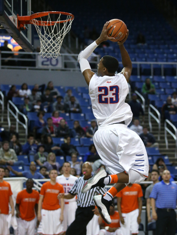 Bishop Gorman’s Nick Blair slam dunks in the Division I NIAA state championship game a ...