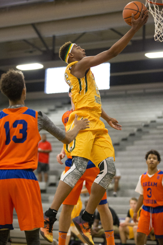 Las Vegas Prospects’ Charles O’Bannon Jr. (25) goes up for a shot against Dream ...