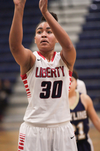 Liberty High School’s Paris Strawther (30), a UNLV signee, attempts a free throw durin ...
