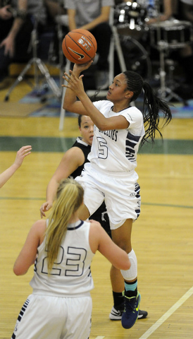 Spring Valley guard Bria Hardin-Davidson (5) goes up for a layup against Faith Lutheran in t ...