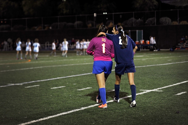 Legacy High School’s Nadia Hernandez (21) Bishop Gorman goalie Jessica Anaya walk off ...