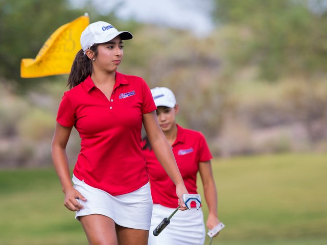 Coronado golfer Victoria Estrada walks the course during the Cougars match with Boulder City ...