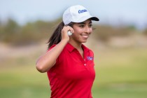 Coronado golfer Victoria Estrada laughs with a teammate during the Cougars match with Bould ...