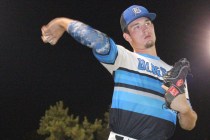 Southern Nevada Blue Sox starting pitcher Trent Bixby warms up prior to Monday night’s ...