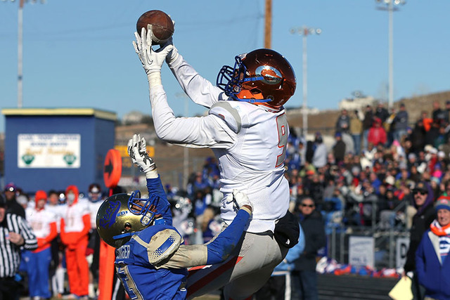 Bishop Gorman’s Brevin Jordan makes a touchdown reception over Reed defender Kyeer Gei ...