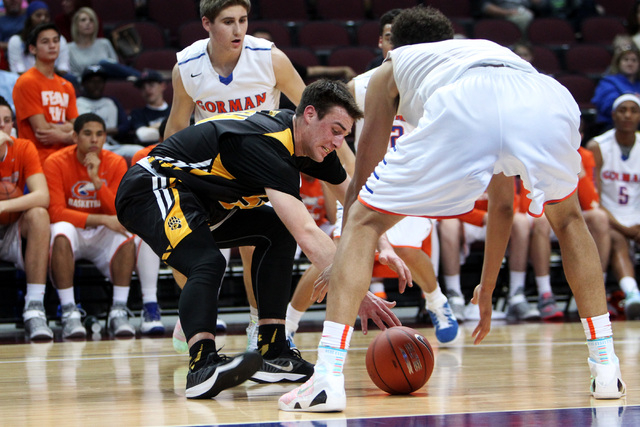 Galena forward Zack Lessinger and Bishop Gorman center Chase Jeter chase a loose ball during ...