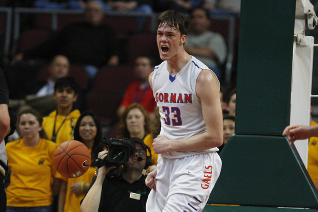 Bishop Gorman center Stephen Zimmerman reacts after dunking on Galena during their Division ...