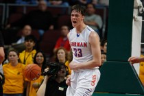 Bishop Gorman center Stephen Zimmerman reacts after dunking on Galena during their Division ...