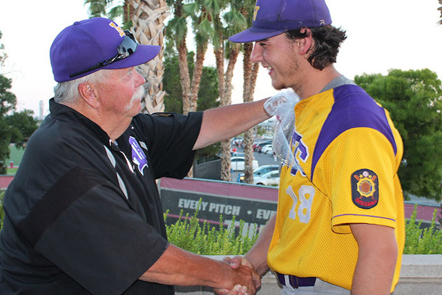 Durango coach Tom Appleyard congratulates starting pitcher Brayden Williams, who pitched a c ...