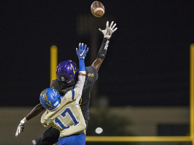 Durango wide receiver Justice Stroy (2) extends to try and make a reception over Sierra Vist ...