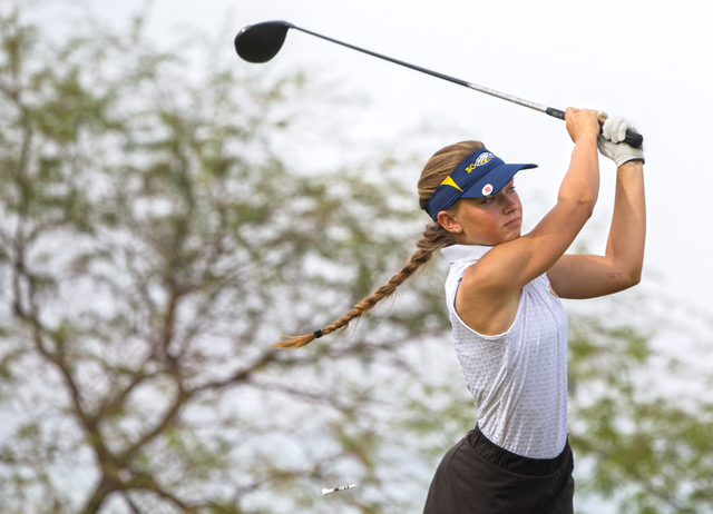 Boulder City golfer Lani Potter hits a drive during the Eagles match with Coronado on Monday ...