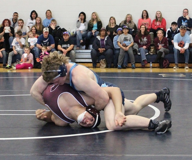 Centennial’s Hunter Brown works his opponent from Cimarron-Memorial, during Saturday’s 1 ...