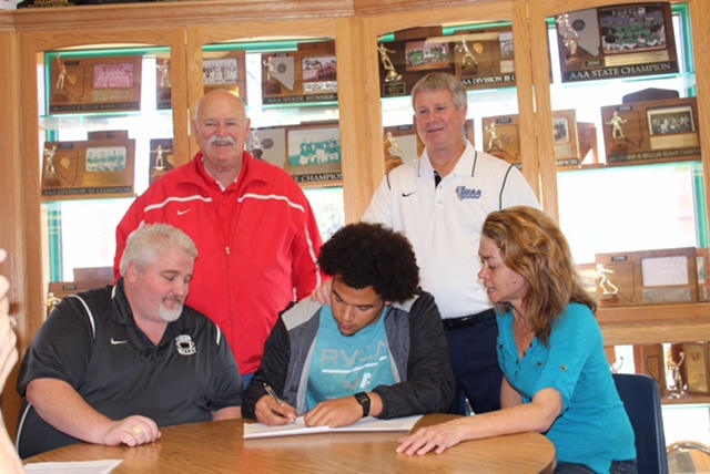 Virgin Valley’s Chase Henderson signs a letter of intent to play football at Eastern A ...