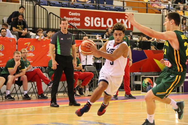 Former Findlay Prep guard Markus Howard (#5) drives to the basket in a game against Lithuani ...