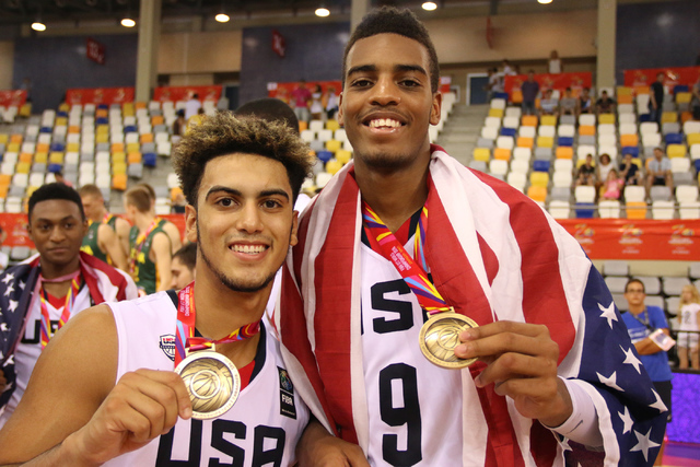 Former Findlay Prep guard Markus Howard (left) and Centennial’s Troy Brown (right) sho ...