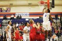 Bishop Gorman’s shooting guard Jamal Bey (2) takes a shot against Coronado during a b ...