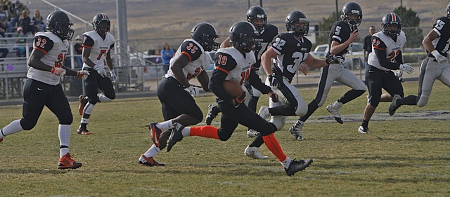 Chaparral’s Tryray Collins returns a kick in the second quarter of a game against Spri ...