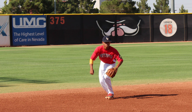 Las Vegas Patriots shortstop Zanden Shim gets set to field a grounder during warm-ups, prior ...