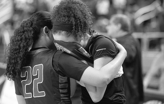 Liberty Patriots Ahlia Tai and Jazmin O’Bannon console each other on the sidelines aft ...