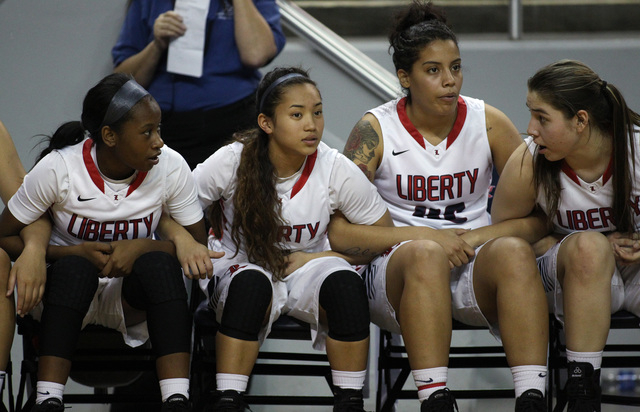 Players on the Liberty bench watch the final seconds of of their Division I state semifinal ...