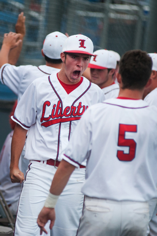 Liberty’s Jacob Steffanich screams in celebration as his team pulls ahead of Centennia ...