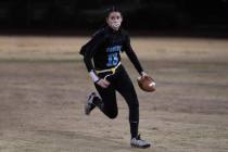 Foothill junior Madisyn McArthur (13) runs in a Southeast League flag football game against ...