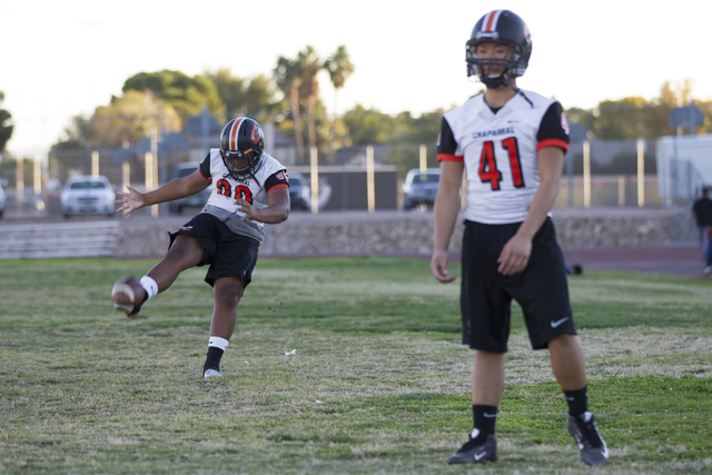 Chaparral’s Jacob Ford (30) kicks a punt during practice on Thursday, Nov. 10, 2016, i ...