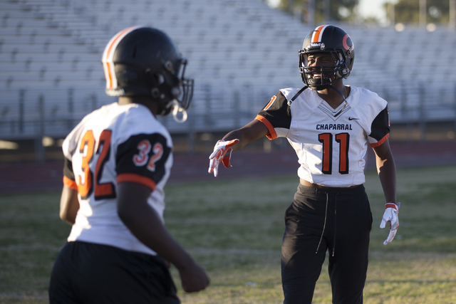 Chaparral’s Kentrell Petite (11) reaches his hand to a coach for a handshake during pr ...