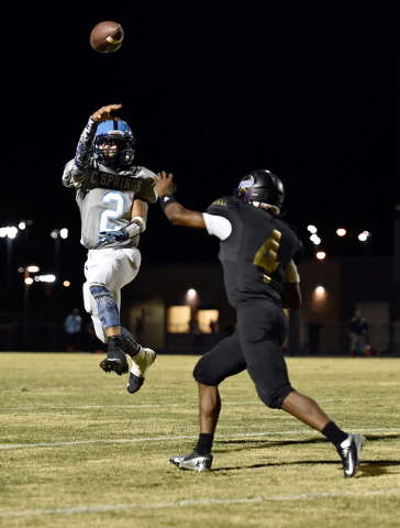 Canyon Springs quarterback Diamante Burton (2) passes the ball against Sunrise Mountain&#821 ...