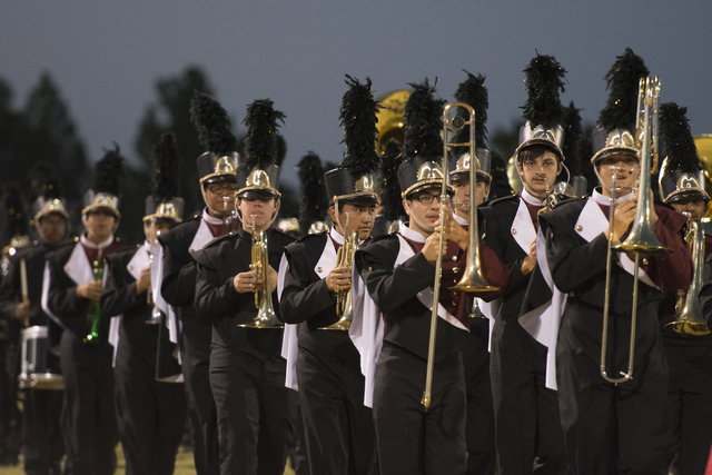 The Del Sol marching band performs during a football game against Chaparral at Del Sol in La ...