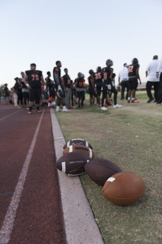 Footballs sit on the side line near Chaparral prior to Eldorado playing the annual “Cl ...