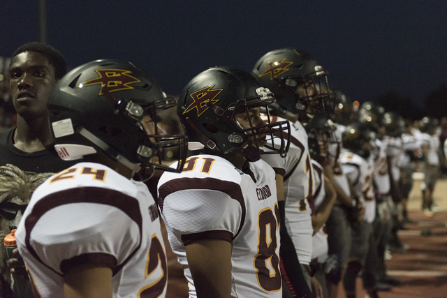 Eldorado football players watch from the sideline as they play at Chaparral in Las Vegas, Fr ...