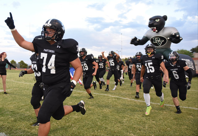 Palo Verde High School football players are introduced during their game against Las Vegas H ...