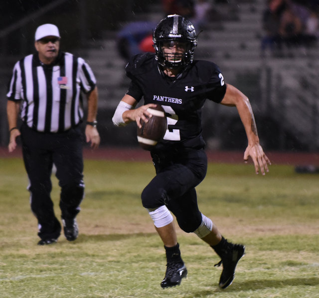 Palo Verde’s Jonathan Schofield (2) runs the football against Las Vegas High School&#8 ...