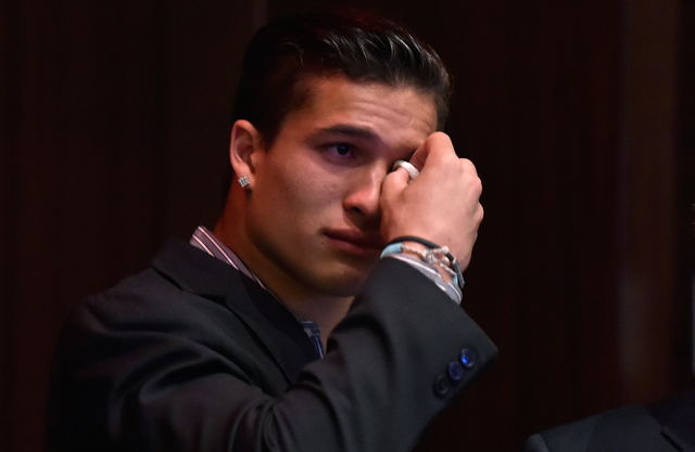 Biaggio Ali Walsh wipes his eyes as he remembers his grandfather, boxer Muhammad Ali, before ...
