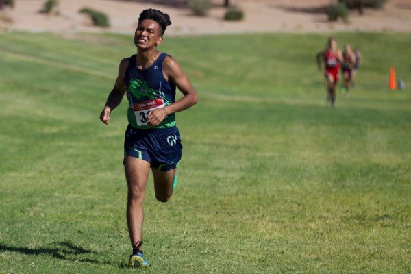 Green Valley’s Jesus Narciso runs to the finish line to take ninth place in the cross ...