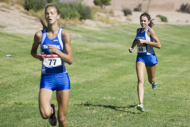 Centennial’s Delani Dietrich, right, runs to the finish line to take fifth place in th ...