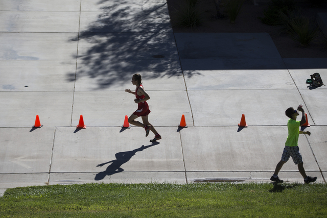 Arbor View’s Ian Jackson, who finished first place, runs in the cross country boys var ...