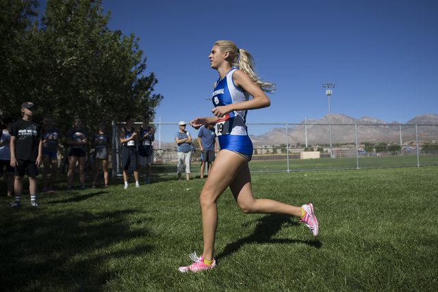 Centennial’s Kayla Roberts, who finished in third place, runs in the cross country gir ...