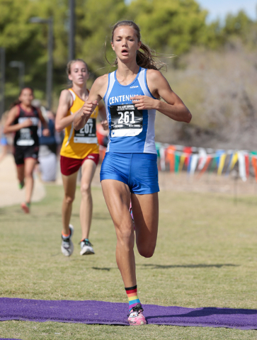 Centennial High School cross country runner Karina Haymore (261) is shown as she crosses the ...