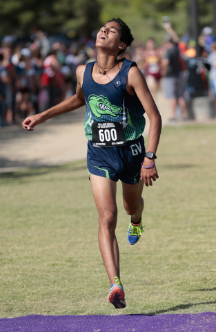 Green Valley’s Milton Amezcua (600) shows exhaustion on his face as he crosses the fin ...