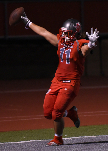 Arbor View’s Zach Melson (11) celebrates after scoring a touchdown against Orem’ ...