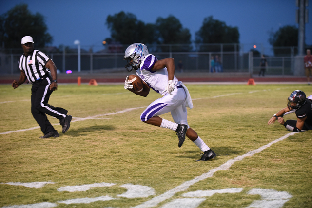 Silverado’s Tyreese Newsome-Johnson (4) runs a fumble recovery for a touchdown against ...