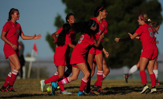 Arbor View players celebrate a goal against Palo Verde during their prep soccer game at Palo ...