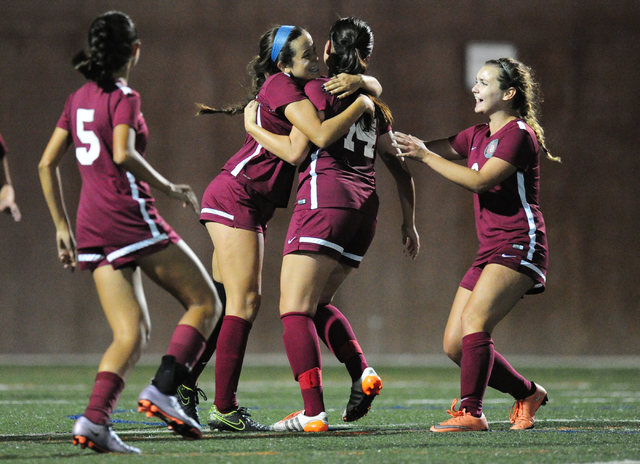 Desert Oasis players celebrate a goal against Bishop Gorman during their prep soccer game at ...