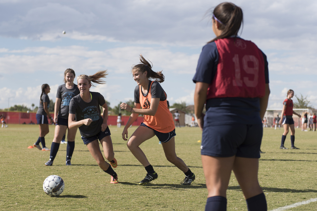 Centennial team members warm-up prior to a girls soccer game at Arbor View in Las Vegas, Thu ...