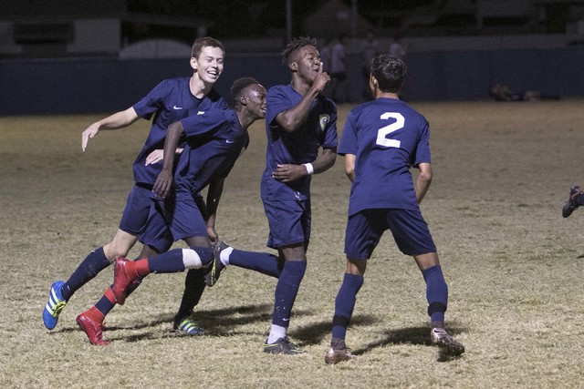 Foothill forward Reagan Mugume, third left, celebrates with teammates after scoring a goal a ...