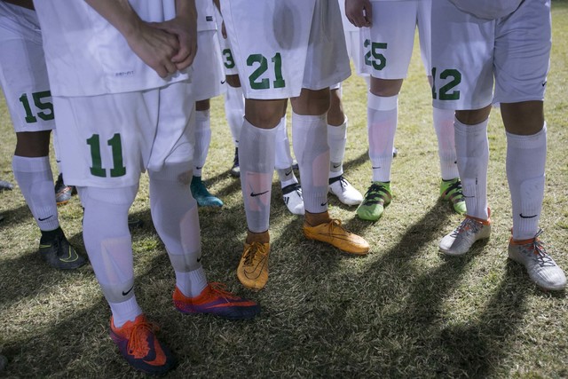 Green Valley soccer players gather at halftime against Foothill during a varsity game at Gre ...