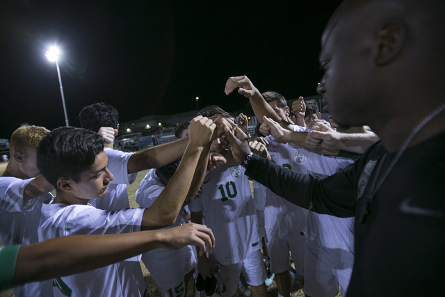Green Valley soccer players gather at halftime against Foothill during a varsity game at Gre ...